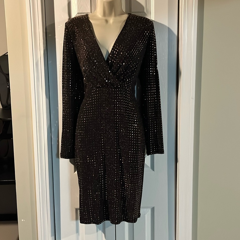Calvin Klein sparkly dress mid length. Comfortable and flattering.